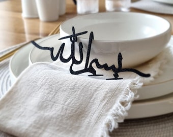 Bismillah Schriftzug. Tischdekoration. Schriftzug arabisch.