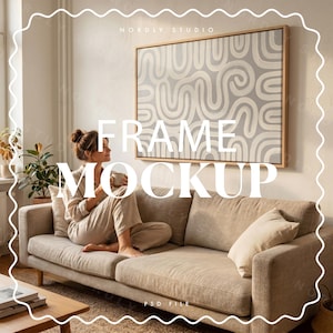May include: A rectangular wooden frame containing a canvas with a light gray and cream abstract pattern of continuous wavy lines. The frame is mounted on a wall above a beige sofa. The text "NORDLY STUDIO" and "FRAME MOCKUP" is overlaid on the image.