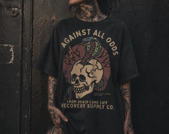 Unisex Against All Odds Comfort Colors Snake and Skull Graphic T-Shirt | Edgy Streetwear Top | Recovery Apparel | Trendy Sobriety Tee