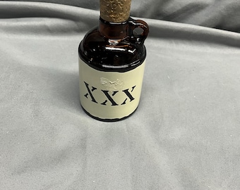 Vintage Avon Little Brown Jug Tai Winds aftershave. Bottle only.      (342)