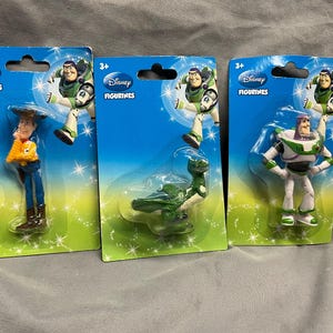 Disney figurines. Buzz, Woody & Rex