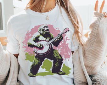 Bigfoot Banjo Unisex Tee, Sasquatch Music Shirt, Funny Cryptid T-Shirt, Folklore Gift, Outdoor Hiking Top, Retro Vintage Style, Appalachian