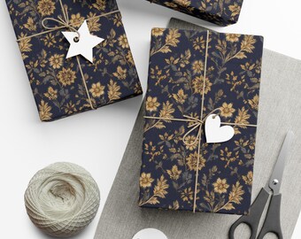 May include: Gift-wrapped presents with navy blue floral patterned paper, tied with twine and white tags. A ball of twine, scissors, and blank tags are also visible, suggesting a DIY gift-wrapping theme.