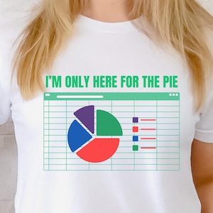 May include: White t-shirt with the text "I'M ONLY HERE FOR THE PIE" above a colorful pie chart graphic. The chart is divided into blue, green, red, and purple sections, with a grid background and colored bars.