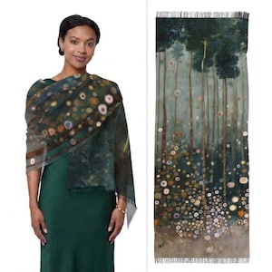 May include: A sheer, dark green scarf with a repeating pattern of circles in shades of brown, gold, and white. The scarf is draped over a person wearing a dark green dress. The scarf has a fringed edge and a matching art print.