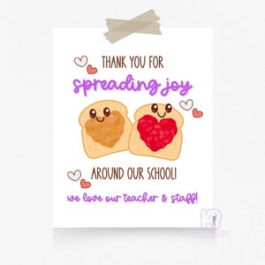 May include: A printable card with a cartoon image of two slices of bread, one with peanut butter and one with jelly, with the text "Thank you for spreading joy around our school! We love our teacher & staff!"