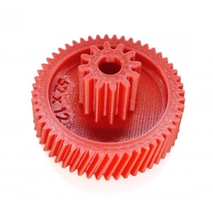 May include: A red plastic gear with 32 teeth. The gear has a smaller gear with 10 teeth in the center.