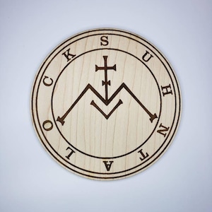 Suhn'Tal'Ock wooden sigil