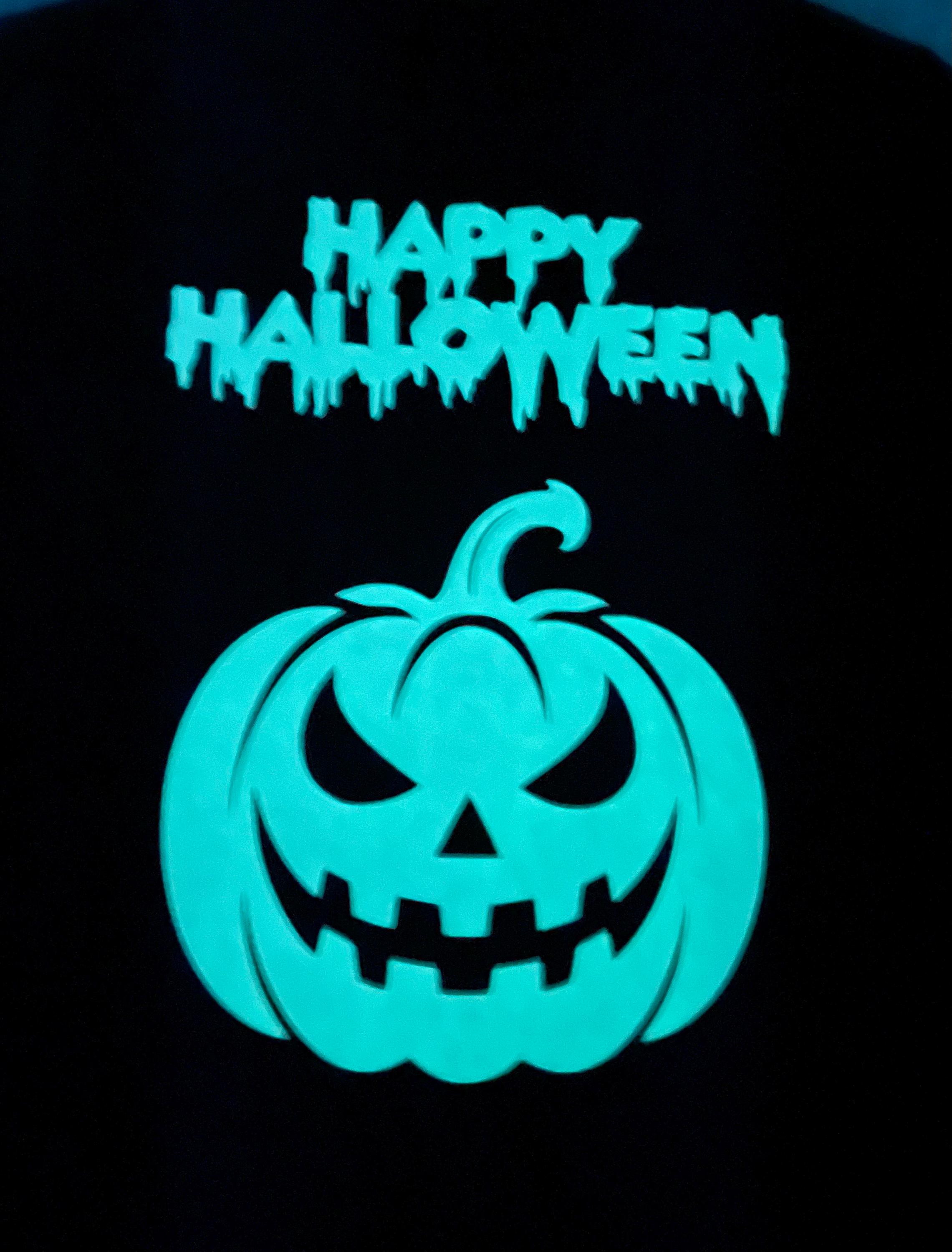 暗闇で光るハロウィーンの子供用楽しいTシャツ、スケルトンまたは