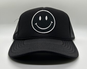 Black Smiley Face Patch Trucker Hat