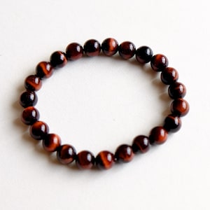 Pulsera de cuentas de ojo de tigre rojo: Piedra del coraje, elemento tierra (8 mm)
