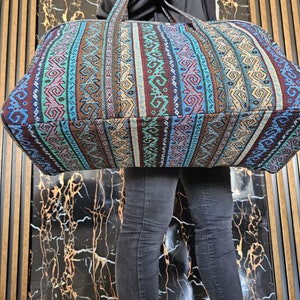 Side view of the Gaziantep handcrafted suitcase, emphasizing its robust and roomy structure.