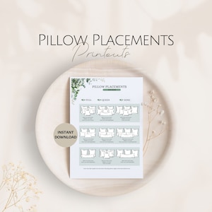 May include: A white printout on a wooden tray shows pillow arrangement suggestions for Full, Queen, and King beds. The printout includes diagrams and the text "Pillow Placements and Sizes" and "Instant Download."