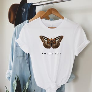 Grafisch T-shirt mot | Vintage geïnspireerd streetwear-T-shirt | Nocturne-collectie uniseks katoen