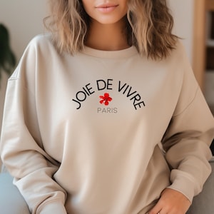 Joie De Vivre, suéter de París - Joy of Living Linda y moderna sudadera para damas, texto en francés, diseño minimalista con una flor