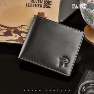 Schwarze feuerfeste Ledergeldbörse für Herren - Premium-Rindsleder Slim Bifold mit 9 Kartenfächern und Bargeldtaschen von Reven Leather