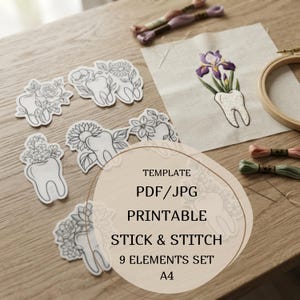 May include: A stick and stitch embroidery template set featuring nine tooth designs with floral motifs. The set includes printable PDF and JPG files for A4 paper. One design is embroidered on fabric in a wooden hoop with purple and green thread.