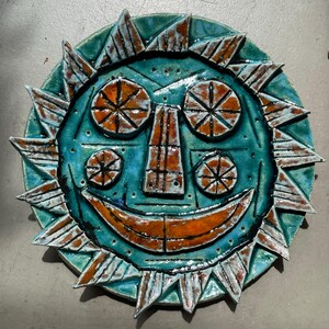 interessante Sonnenskulptur fuer wand oder garten