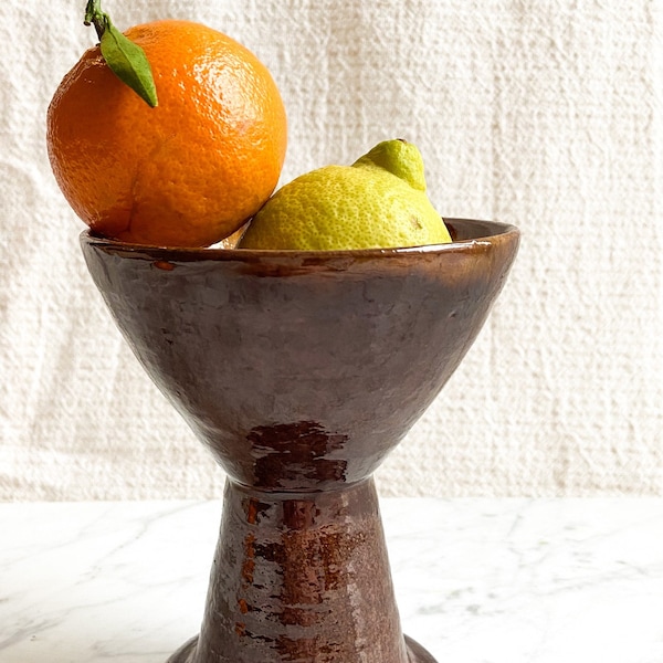 Studio pottery pedestal vessel in caramel