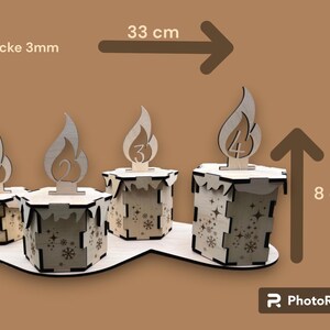 May include: Four wooden candle holders with a snowflake design. Each holder has a number from 1 to 4 on the top. The holders are 8 cm tall and 33 cm wide. Holzdicke 3mm.