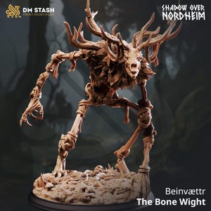 May include: A brown fantasy miniature of a creature with a deer skull head and large antlers. The figure is posed in a standing position with skeletal limbs and wrapped joints. The base reads "Beinvættr The Bone Wight" and the top reads "Shadow Over Nordheim".