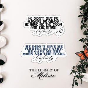 May include: Two stickers with the quote "He didn't give me flowers or candy. He gave me the moon and the stars. Infinity." The stickers are white with black and blue text. The words "The Library of Melissa" are also visible.
