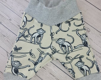 Pump pants made of alpine fleece for babies with a monkey motif, beige size 50-68