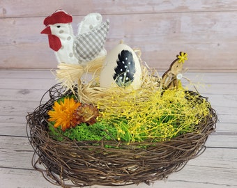 Easter nest, Easter nest on wooden disc with painted goose egg, Easter decoration, Easter, home