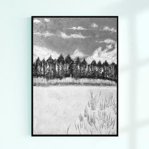 May include: Black and white landscape art print in a black frame. The artwork depicts a forest line under a cloudy sky, with a field of tall grass in the foreground. The style is reminiscent of a charcoal drawing.