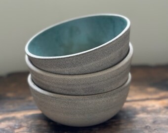 Ceramic bowls for soup or cereal or snacks in grey cement clay. Industrial design. Handmade on the pottery wheel and kiln fired.