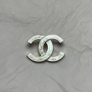 Vintage Excellent Gold Tone Chanel Brooch With White Insert
