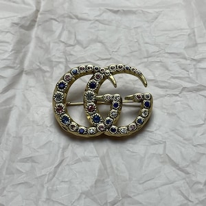 Vintage Gucci Gold Brooch With Blue Stones