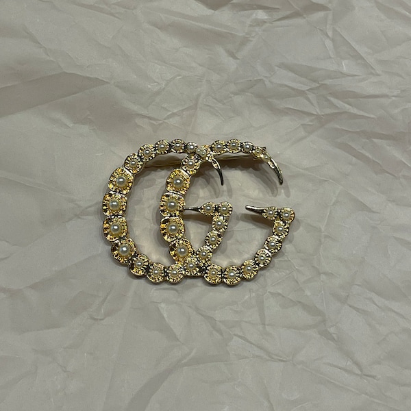 Vintage Gucci gouden broche met parels