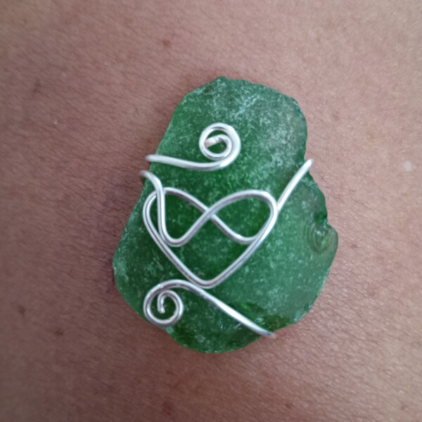 Infinity heart wrap on sea glass pendant.