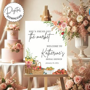 Puede incluir: Un cartel blanco con ilustraciones florales y el texto "She's Fresh Off The Market" y "Welcome to Katherine's Bridal Shower January 16, 202x".
