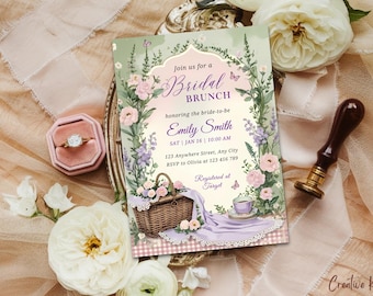 May include: A bridal brunch invitation with floral and butterfly illustrations. The invitation includes the text "Join us for a Bridal Brunch" and details for the event. A ring in a pink box, flowers, and a wax seal are also present.
