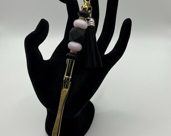 Gold Beaded letter opener with metal clip and black tassel