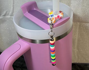 Blue & orange vivid flowers silicone straw dangler. Various colors round petite silicone beads start with cream end with pink.
