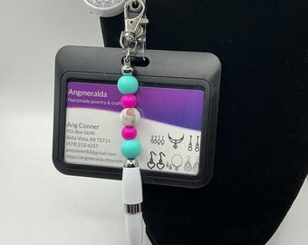 Teal pink and gray mandala lanyard with black ID case and white pen casing. Magenta and teal silicone beads plus brown / white marbled bead