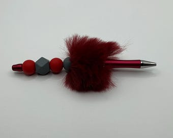 Ballpoint pen with red & gray silicone beads and fluff.