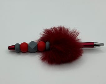 Ballpoint pen with red & gray silicone beads and fluff.