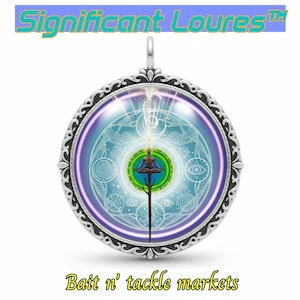 May include: A round silver pendant featuring an ornate filigree border and a central glass cabochon. The image inside displays a figure in a meditative pose atop a vertical staff, surrounded by a glowing green circle and intricate white line art.