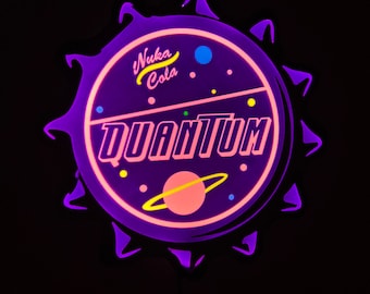 May include: A neon sign with a circular design featuring the words "Nuka Cola Quantum" in a retro font. The sign has a purple and pink color scheme with a planet and stars graphic. The sign is surrounded by a jagged edge.
