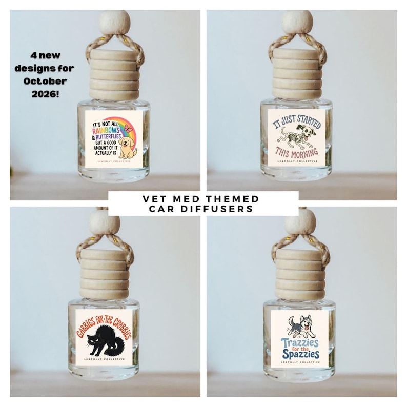 May include: Four clear glass car diffusers with wooden caps and hanging ropes. Each bottle features a unique graphic label: a golden retriever with a rainbow, a skeleton dog, a black cat, and a husky. Text includes "It's not all rainbows & butterflies", "It just started this morning", "Gabbies for the crabbies", and "Trazzies for the spazzies".