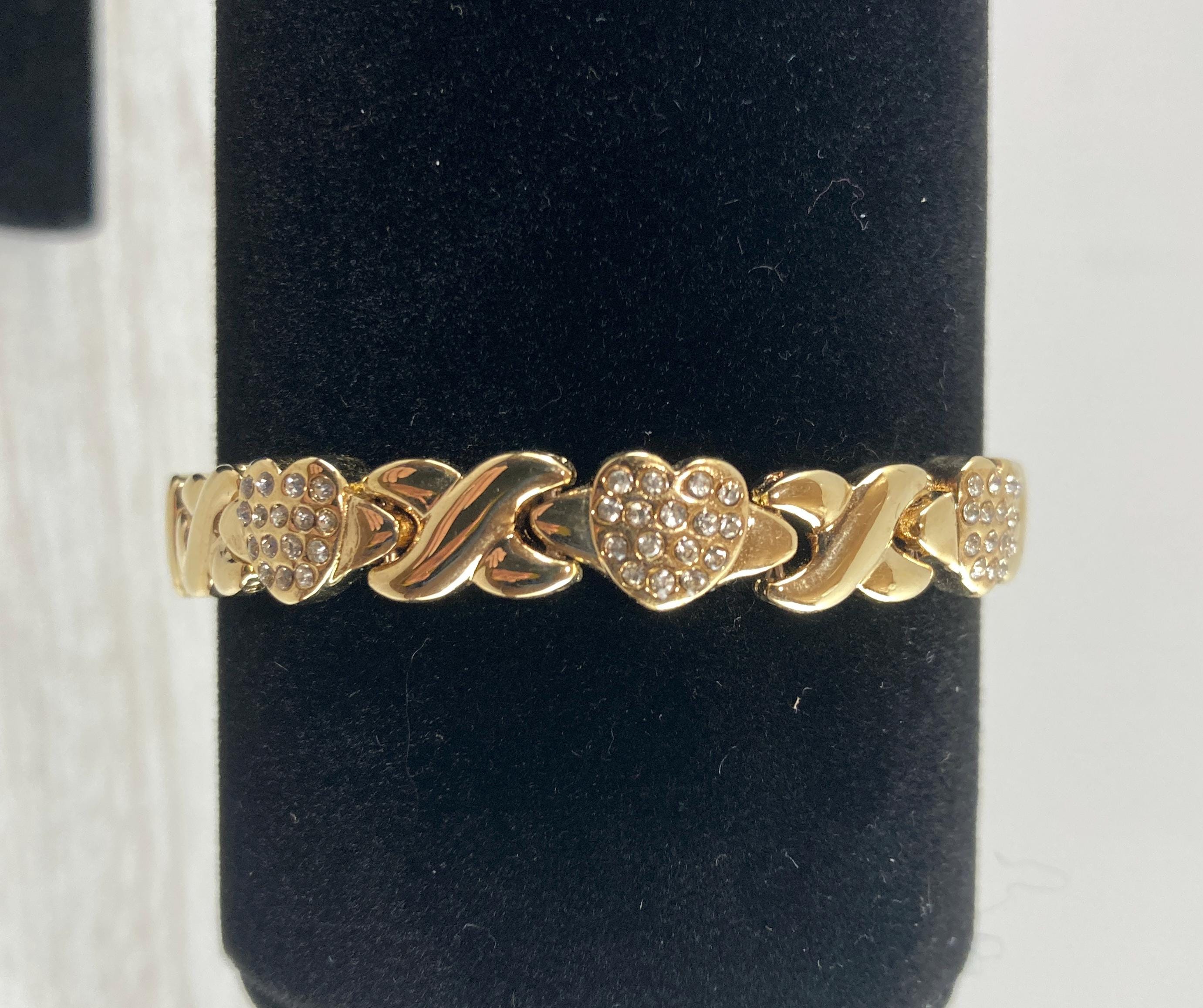 Gold Tone XO Bracelet with Rhinestone Hearts: 6.5 Inches