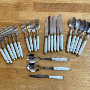 May include: A rustic wooden sign with the text "Welcome to our home" in a handwritten style. The sign features a distressed finish and a simple, inviting design, perfect for a front porch or entryway.