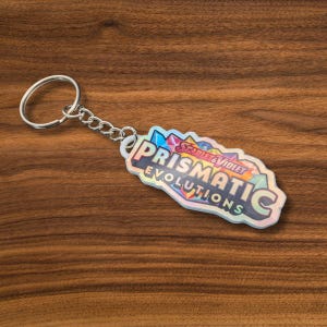 Pokémon Prismatic Evolutions Binder Tag Keychain – Holographic, 3D, Waterproof-  Fits Any Binder Zip, Rare Zone Accessory