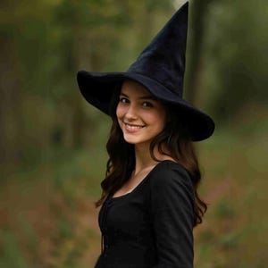 May include: A black witch hat with a wide brim and a tall, pointed crown. The hat is made of a soft, dark material. The hat is part of a costume or accessory.