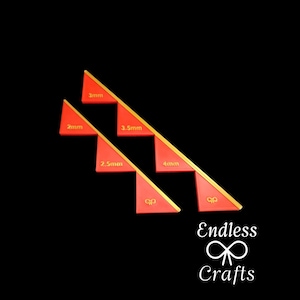 May include: Set of five red plastic triangles with gold trim and measurements in millimetres: 2mm, 2.5mm, 3mm, 3.5mm, and 4mm.  Endless Crafts logo is visible in the bottom right corner.
