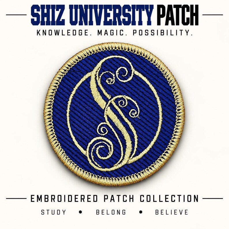 May include: A circular embroidered patch featuring a dark blue background with a gold stitched border. In the centre, a stylised gold letter S is depicted with decorative swirls. The text SHIZ UNIVERSITY PATCH KNOWLEDGE. MAGIC. POSSIBILITY. EMBROIDERED PATCH COLLECTION STUDY. BELONG. BELIEVE is visible.